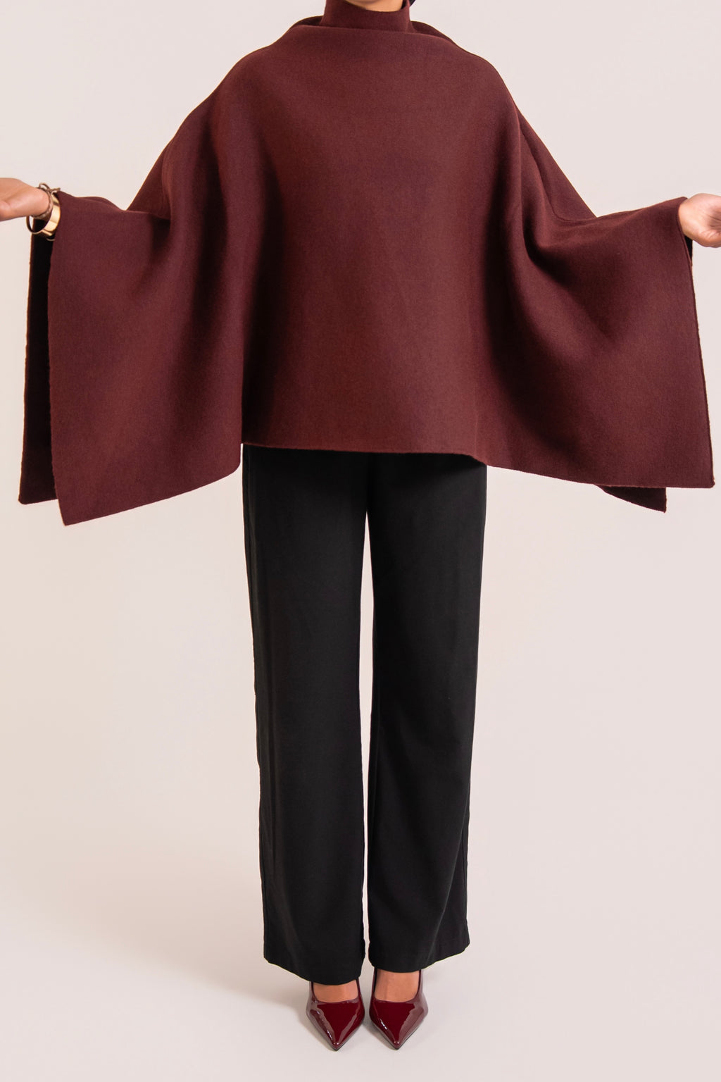 Cape en maille bordeaux